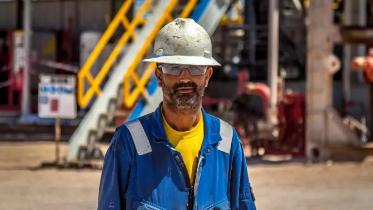 Oil and gas workers in safety gear during training session